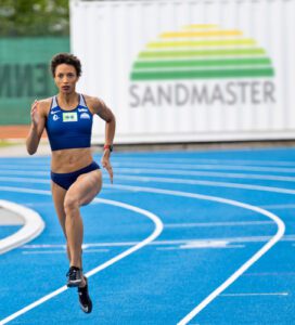 Malaika runs on running track